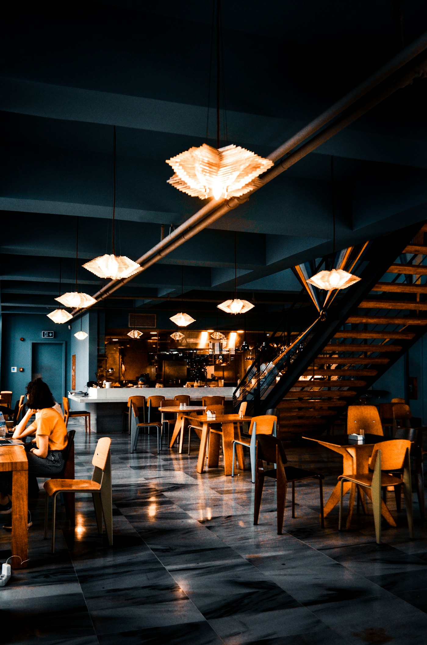 Lamp-lit dining room set for evening service